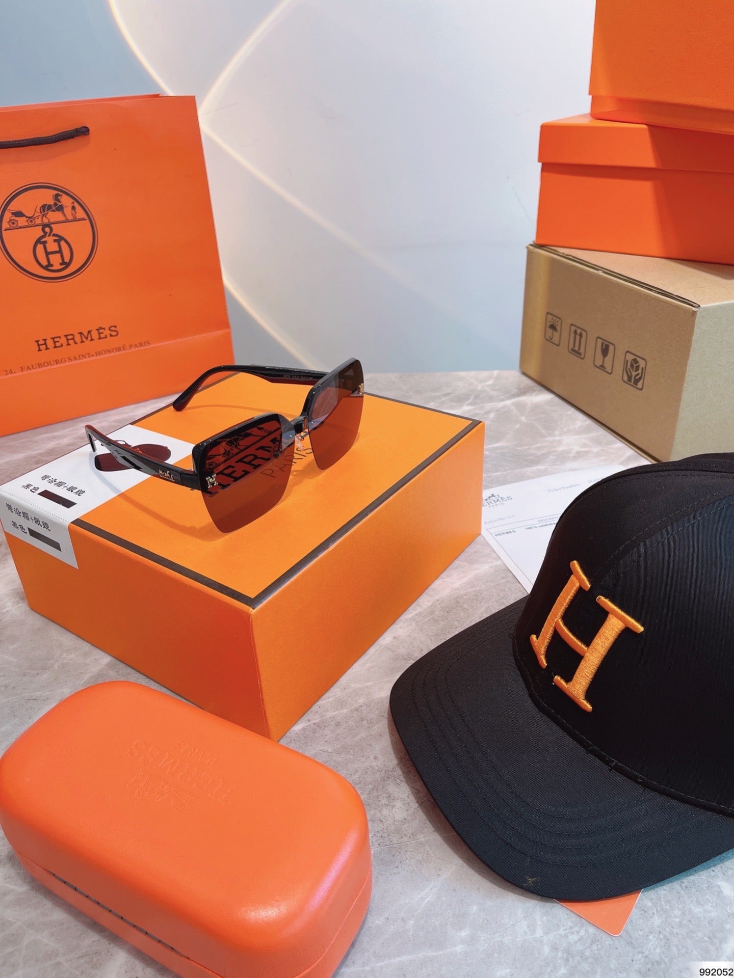 Luxury Head-to-Toe: H Hat and Sunglasses Gift Box for Discerning Fashion Enthusiasts